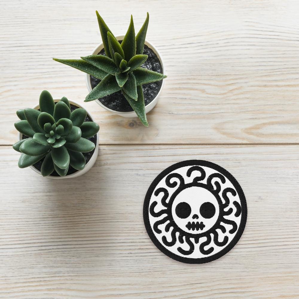 Spooky Cute Grunge Medusa Embroidered Patch With White Background and Black Stitching